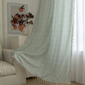 Minimalist sage green curtain with subtle vertical white embroidery and delicate tassel edging — perfect for creating a fresh, airy, and elegant atmosphere in any living room, bedroom, or dining space.