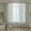 Minimalist sage green curtain with subtle vertical white embroidery and delicate tassel edging — perfect for creating a fresh, airy, and elegant atmosphere in any living room, bedroom, or dining space.