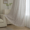 Elegant beige curtain with subtle vertical white embroidery and soft tassel trim — a versatile and timeless design that adds warmth, texture, and understated sophistication to any room decor.