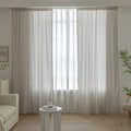 Elegant beige curtain with subtle vertical white embroidery and soft tassel trim — a versatile and timeless design that adds warmth, texture, and understated sophistication to any room decor.