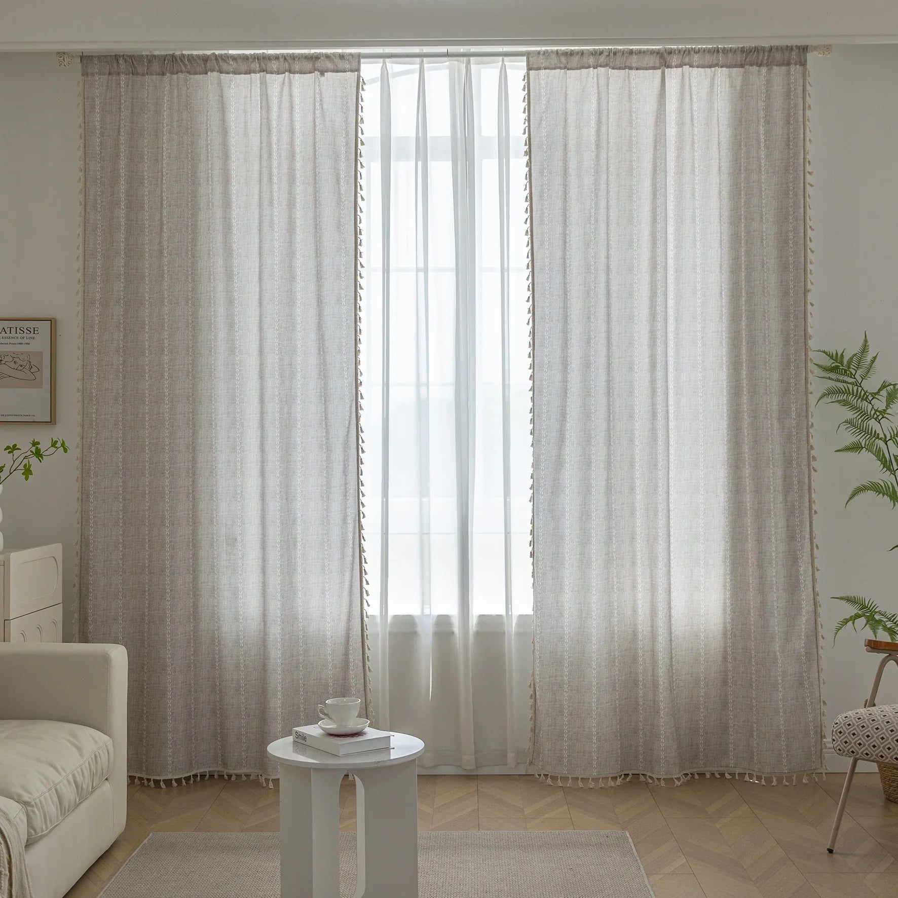 Elegant beige curtain with subtle vertical white embroidery and soft tassel trim — a versatile and timeless design that adds warmth, texture, and understated sophistication to any room decor.