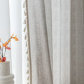 Elegant beige curtain with subtle vertical white embroidery and soft tassel trim — a versatile and timeless design that adds warmth, texture, and understated sophistication to any room decor.