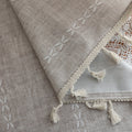 Elegant beige curtain with subtle vertical white embroidery and soft tassel trim — a versatile and timeless design that adds warmth, texture, and understated sophistication to any room decor.