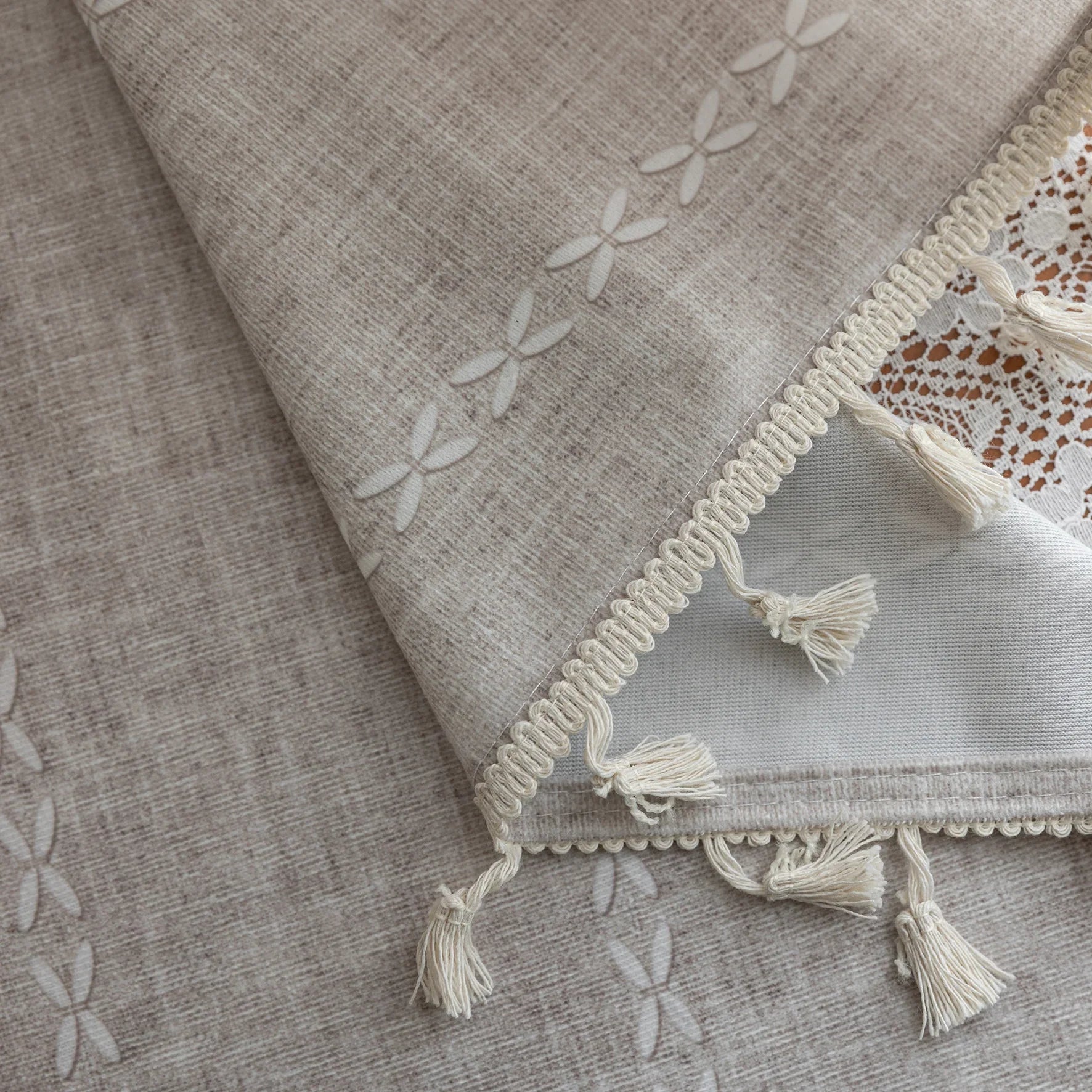 Elegant beige curtain with subtle vertical white embroidery and soft tassel trim — a versatile and timeless design that adds warmth, texture, and understated sophistication to any room decor.