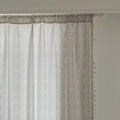 Elegant beige curtain with subtle vertical white embroidery and soft tassel trim — a versatile and timeless design that adds warmth, texture, and understated sophistication to any room decor.