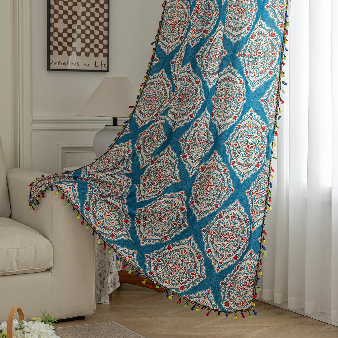 Elegant bohemian curtain featuring intricate Moroccan-inspired patterns in vibrant red, green, and gold on a rich turquoise background, finished with colorful tassel trim — perfect for adding a bold, artistic, and exotic flair to your home decor.