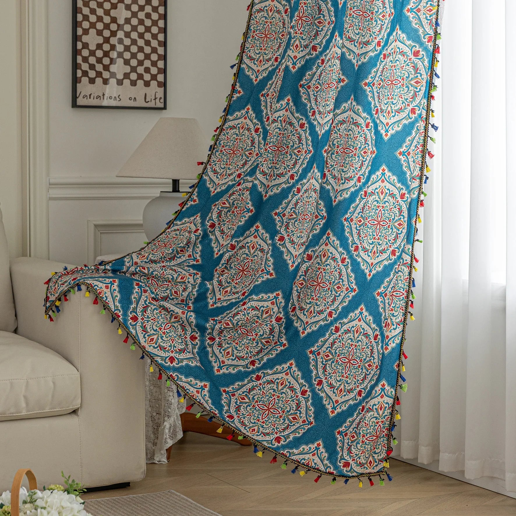 Elegant bohemian curtain featuring intricate Moroccan-inspired patterns in vibrant red, green, and gold on a rich turquoise background, finished with colorful tassel trim — perfect for adding a bold, artistic, and exotic flair to your home decor.