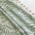 Botanical-themed curtain featuring lush green fern and leaf prints on a soft beige background, accented with delicate tassel trim — perfect for bringing a fresh, natural, and calming touch to any living space.