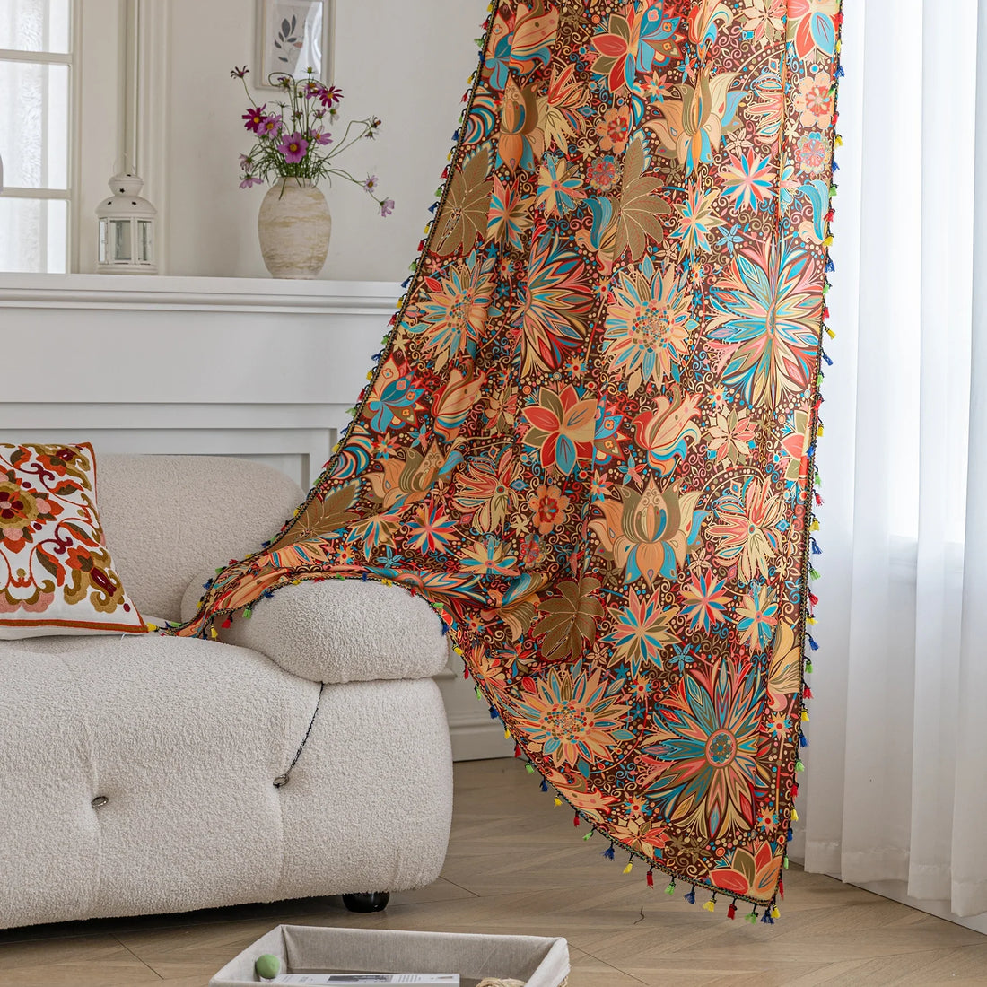 Vibrant bohemian curtain with intricate mandala and floral patterns in rich shades of red, turquoise, gold, and orange, finished with colorful tassel trim — perfect for adding an artistic, eclectic, and lively touch to any room decor.