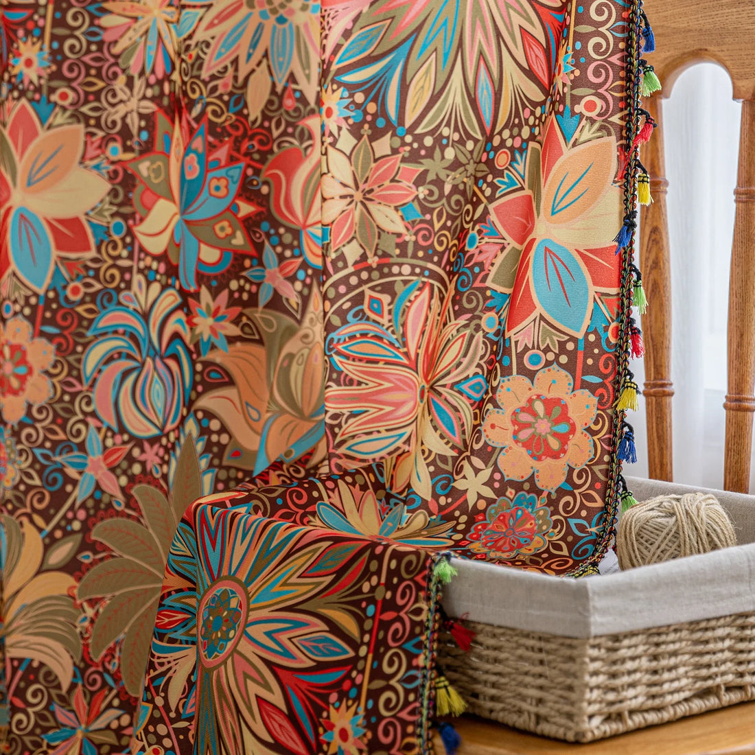 Vibrant bohemian curtain with intricate mandala and floral patterns in rich shades of red, turquoise, gold, and orange, finished with colorful tassel trim — perfect for adding an artistic, eclectic, and lively touch to any room decor.