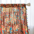 Vibrant bohemian curtain with intricate mandala and floral patterns in rich shades of red, turquoise, gold, and orange, finished with colorful tassel trim — perfect for adding an artistic, eclectic, and lively touch to any room decor.