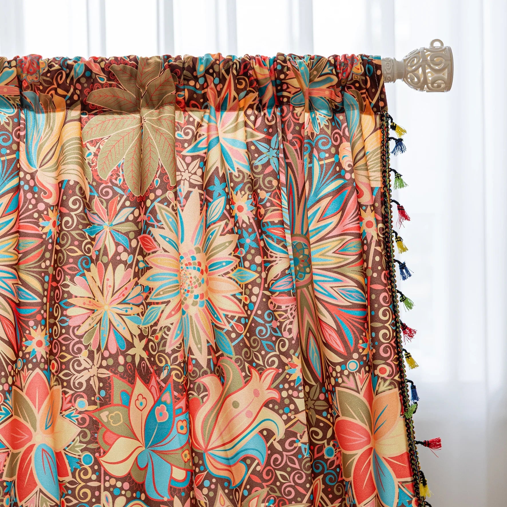 Vibrant bohemian curtain with intricate mandala and floral patterns in rich shades of red, turquoise, gold, and orange, finished with colorful tassel trim — perfect for adding an artistic, eclectic, and lively touch to any room decor.