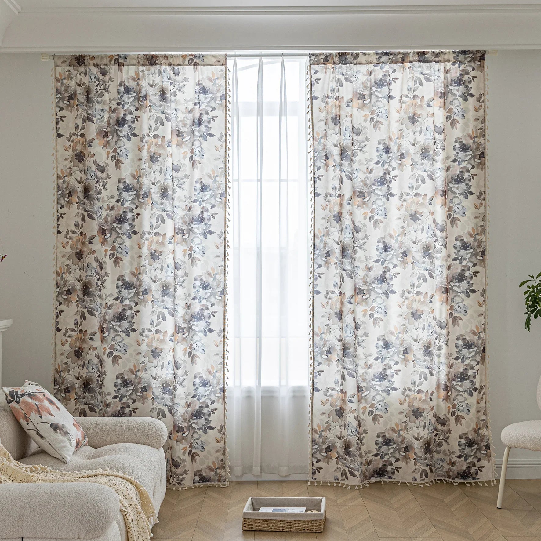 Chic beige curtain with soft watercolor-style floral prints in earthy tones of brown, taupe, and grey, accented with delicate tassel trim — ideal for adding a warm, elegant, and nature-inspired touch to any living space.