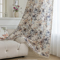 Chic beige curtain with soft watercolor-style floral prints in earthy tones of brown, taupe, and grey, accented with delicate tassel trim — ideal for adding a warm, elegant, and nature-inspired touch to any living space.