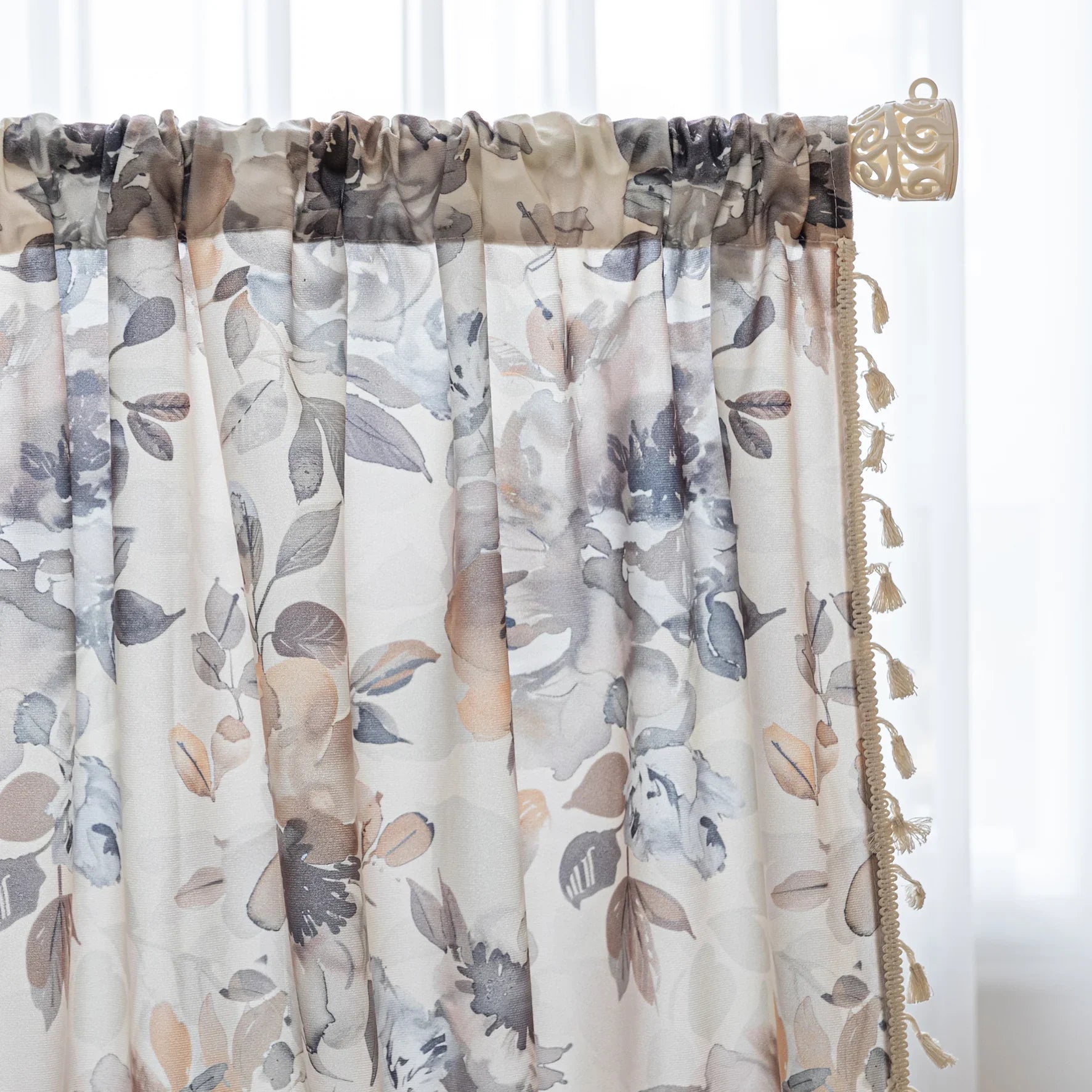 Chic beige curtain with soft watercolor-style floral prints in earthy tones of brown, taupe, and grey, accented with delicate tassel trim — ideal for adding a warm, elegant, and nature-inspired touch to any living space.