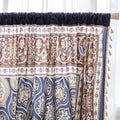 Luxurious bohemian curtain featuring an intricate mandala-inspired medallion design in rich navy blue, earthy brown, and soft beige tones, accented with elegant tassel trim — ideal for adding a touch of Moroccan or Middle Eastern charm to your living space.