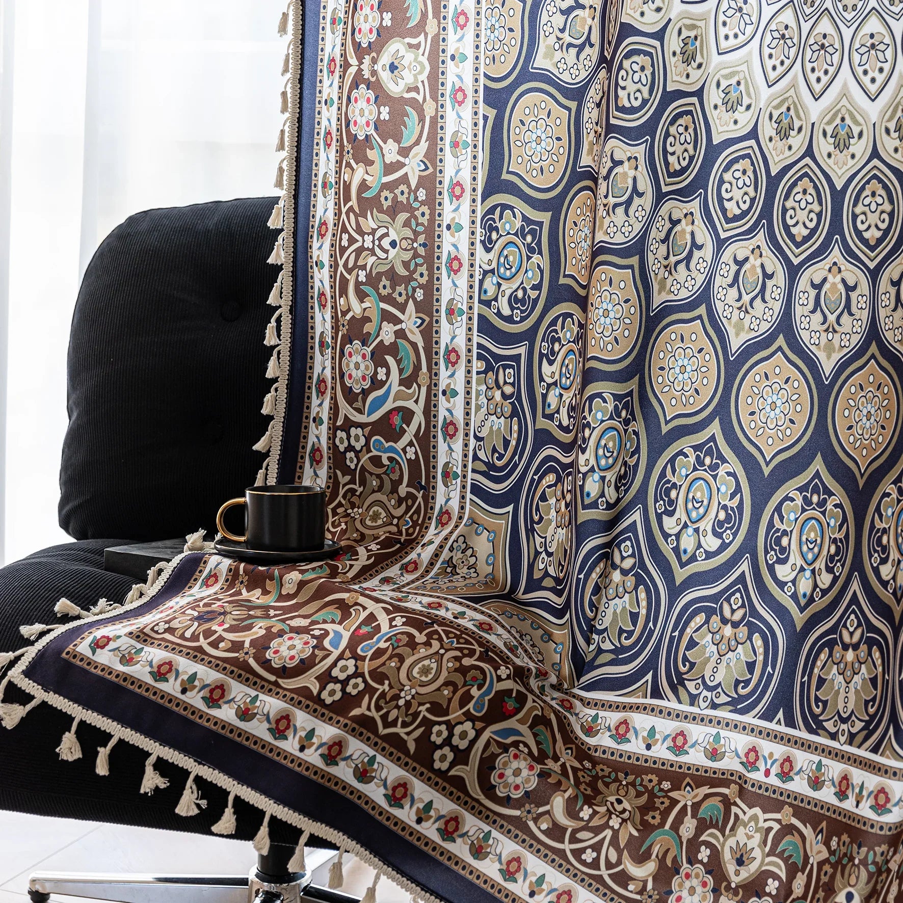 Luxurious bohemian curtain featuring an intricate mandala-inspired medallion design in rich navy blue, earthy brown, and soft beige tones, accented with elegant tassel trim — ideal for adding a touch of Moroccan or Middle Eastern charm to your living space.