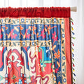 Bold and vibrant curtain featuring a striking red base with intricate multicolor floral and geometric patterns, framed by an ornate navy and gold border — perfect for adding warmth, personality, and cultural flair to your living space.