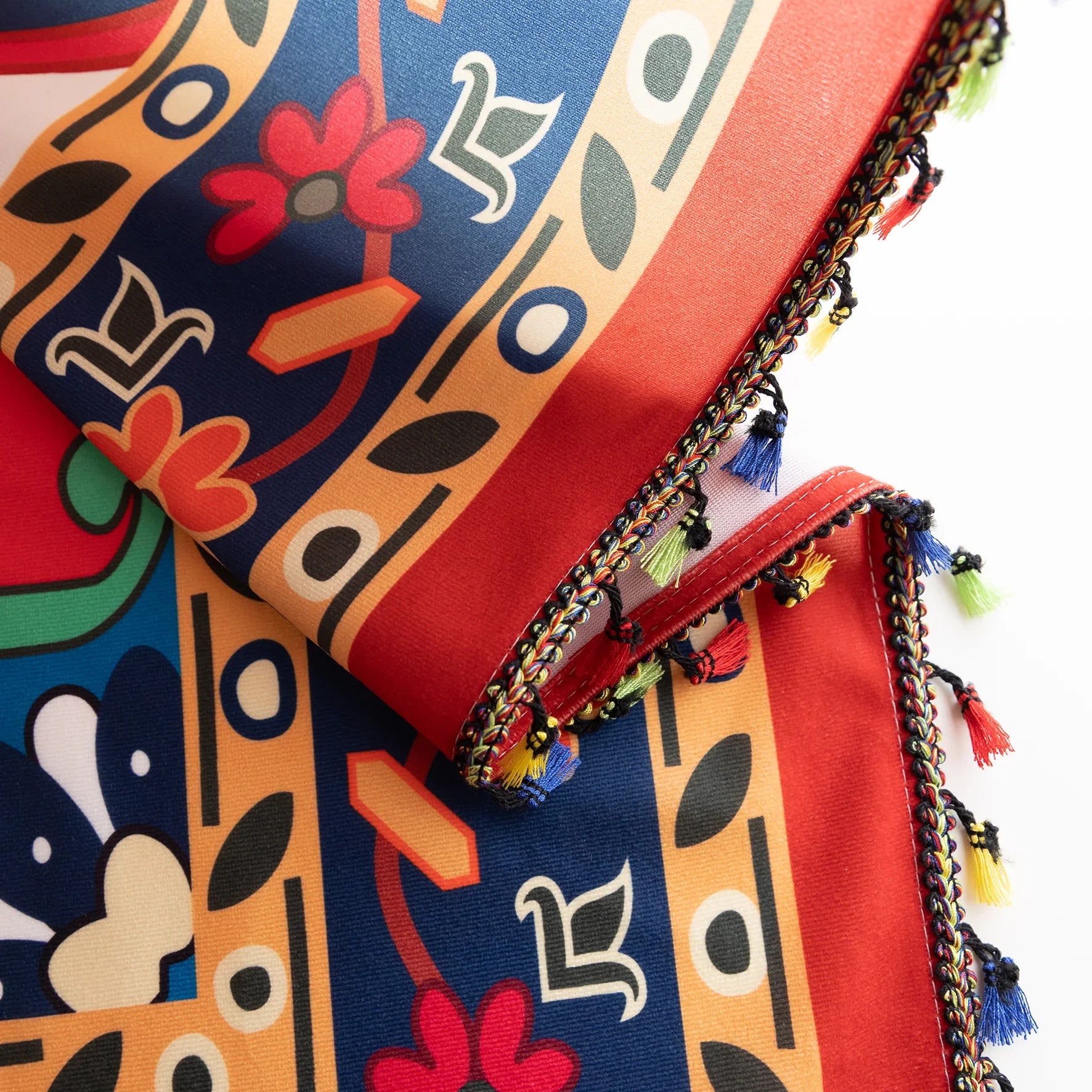Bold and vibrant curtain featuring a striking red base with intricate multicolor floral and geometric patterns, framed by an ornate navy and gold border — perfect for adding warmth, personality, and cultural flair to your living space.