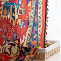 Bold and vibrant curtain featuring a striking red base with intricate multicolor floral and geometric patterns, framed by an ornate navy and gold border — perfect for adding warmth, personality, and cultural flair to your living space.