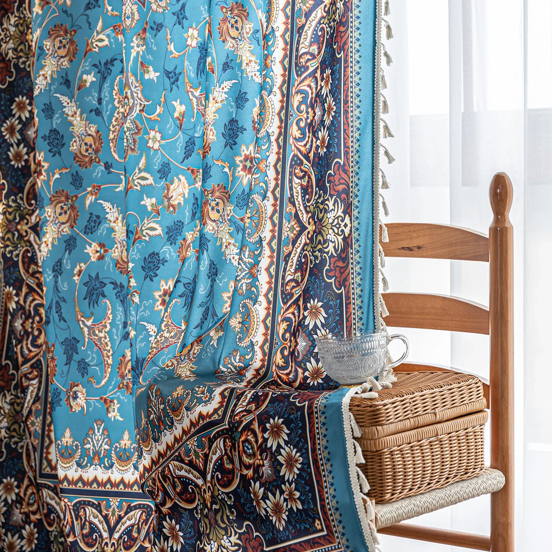Luxurious curtain with a rich turquoise base, adorned with intricate floral and paisley patterns in warm earthy tones, framed by an ornate contrasting border — ideal for adding elegance and cultural charm to any room.