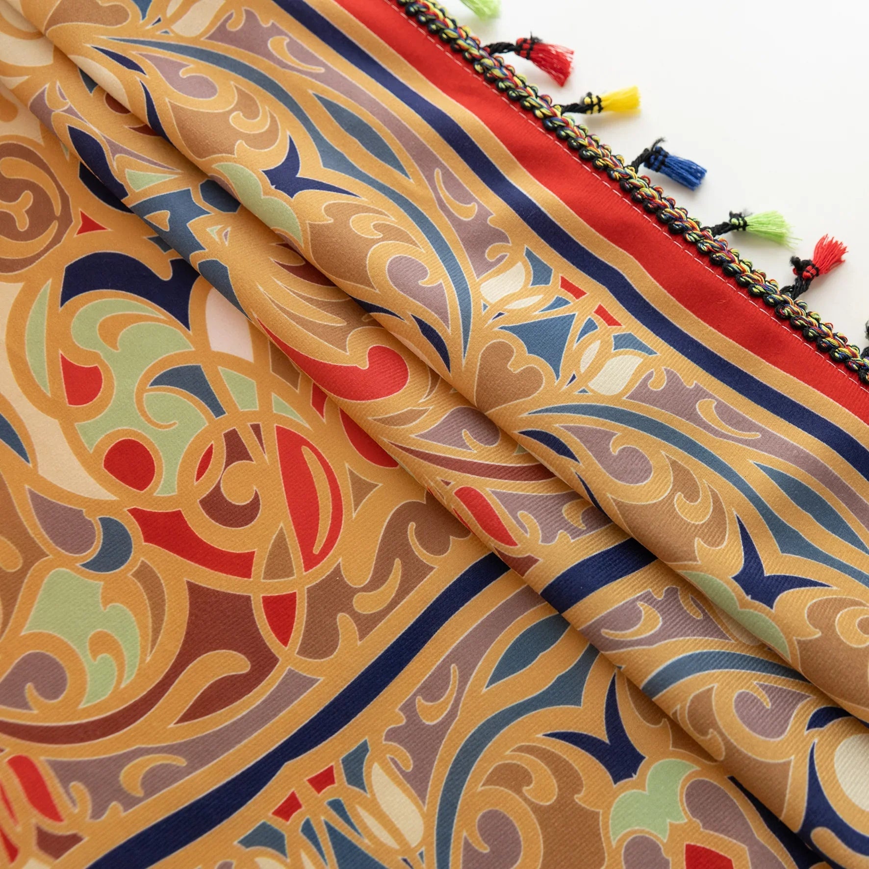 Elegant curtain with intricate multicolor floral and geometric patterns, framed by a decorative border and colorful tassels — perfect for adding a vibrant, artistic touch to any living space.