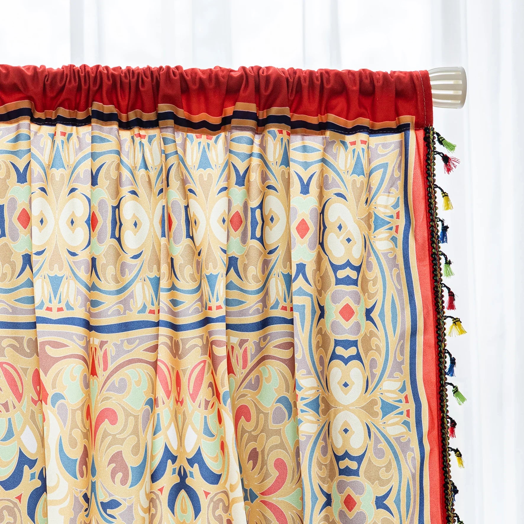 Elegant curtain with intricate multicolor floral and geometric patterns, framed by a decorative border and colorful tassels — perfect for adding a vibrant, artistic touch to any living space.