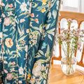 Dark teal floral curtain with vibrant botanical prints, adding a fresh, elegant, and nature-inspired touch to any room décor.