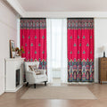 Vibrant Red Bohemian Curtains – Infuse your home with bold color and artistic flair using these stunning red curtains adorned with intricate multicolor ethnic patterns. The rich crimson backdrop is complemented by an elaborate border design in green, gold, and black, with small paisley-style motifs scattered throughout. Crafted from lightweight fabric, they softly filter sunlight while adding a warm, inviting atmosphere to any room. Perfect for living rooms, bedrooms, or creative spaces, these tassel-trimme