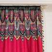 Vibrant Red Bohemian Curtains ¨C Infuse your home with bold color and artistic flair using these stunning red curtains adorned with intricate multicolor ethnic patterns. The rich crimson backdrop is complemented by an elaborate border design in green, gold, and black, with small paisley-style motifs scattered throughout. Crafted from lightweight fabric, they softly filter sunlight while adding a warm, inviting atmosphere to any room. Perfect for living rooms, bedrooms, or creative spaces, these tassel-trimm