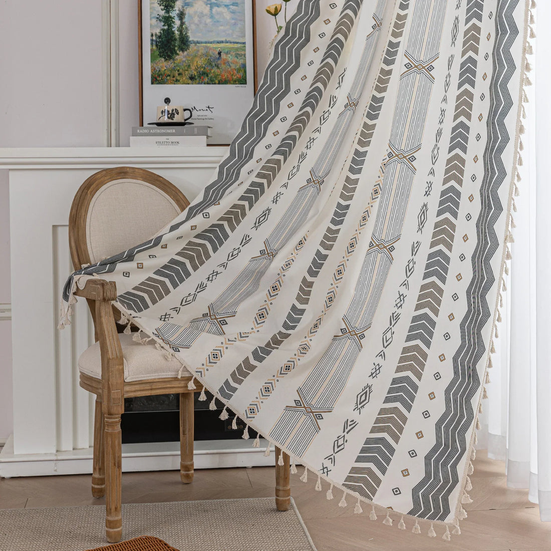 Boho Geometric Patterned Curtains – Elevate your home décor with these elegant cream curtains featuring intricate tribal-inspired geometric designs in earthy gray, beige, and gold tones. Crafted from soft, breathable fabric, they allow gentle natural light to filter through while providing a cozy, inviting atmosphere. The stylish tassel trim adds a charming bohemian touch, making them perfect for living rooms, bedrooms, or creative spaces seeking a modern yet warm aesthetic.
