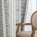 Boho Geometric Patterned Curtains – Elevate your home décor with these elegant cream curtains featuring intricate tribal-inspired geometric designs in earthy gray, beige, and gold tones. Crafted from soft, breathable fabric, they allow gentle natural light to filter through while providing a cozy, inviting atmosphere. The stylish tassel trim adds a charming bohemian touch, making them perfect for living rooms, bedrooms, or creative spaces seeking a modern yet warm aesthetic.
