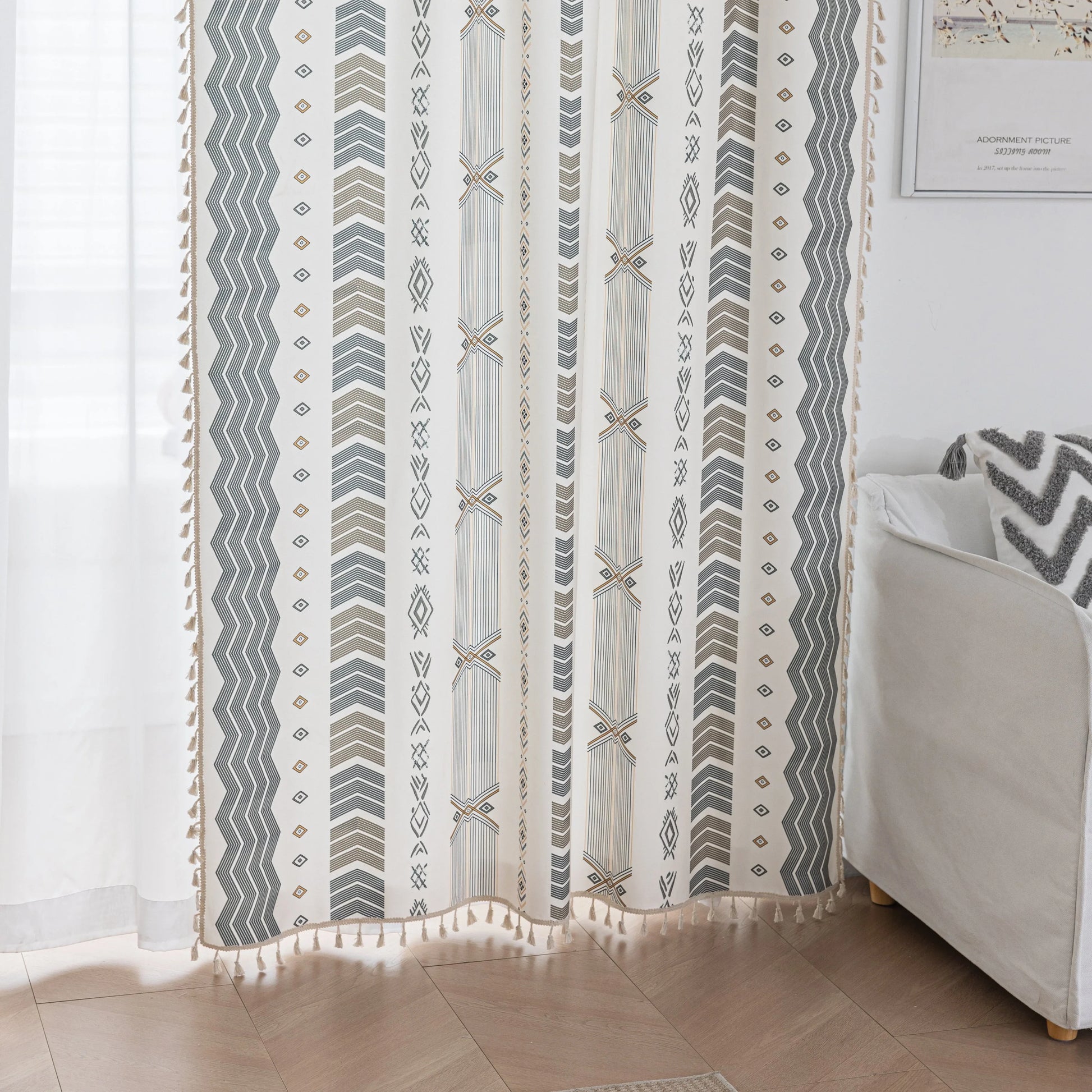 Boho Geometric Patterned Curtains – Elevate your home décor with these elegant cream curtains featuring intricate tribal-inspired geometric designs in earthy gray, beige, and gold tones. Crafted from soft, breathable fabric, they allow gentle natural light to filter through while providing a cozy, inviting atmosphere. The stylish tassel trim adds a charming bohemian touch, making them perfect for living rooms, bedrooms, or creative spaces seeking a modern yet warm aesthetic.
