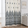 Elegant Black and White Bohemian Curtains – Add timeless charm to your home with these white curtains adorned with intricate black floral and paisley patterns. The bold border design at the base transitions into delicate motifs toward the top, creating a balanced, eye-catching look. Made from soft, lightweight fabric, they allow natural light to filter through while maintaining privacy. Perfect for living rooms, bedrooms, or creative spaces, these tassel-trimmed curtains bring a sophisticated boho vibe to a