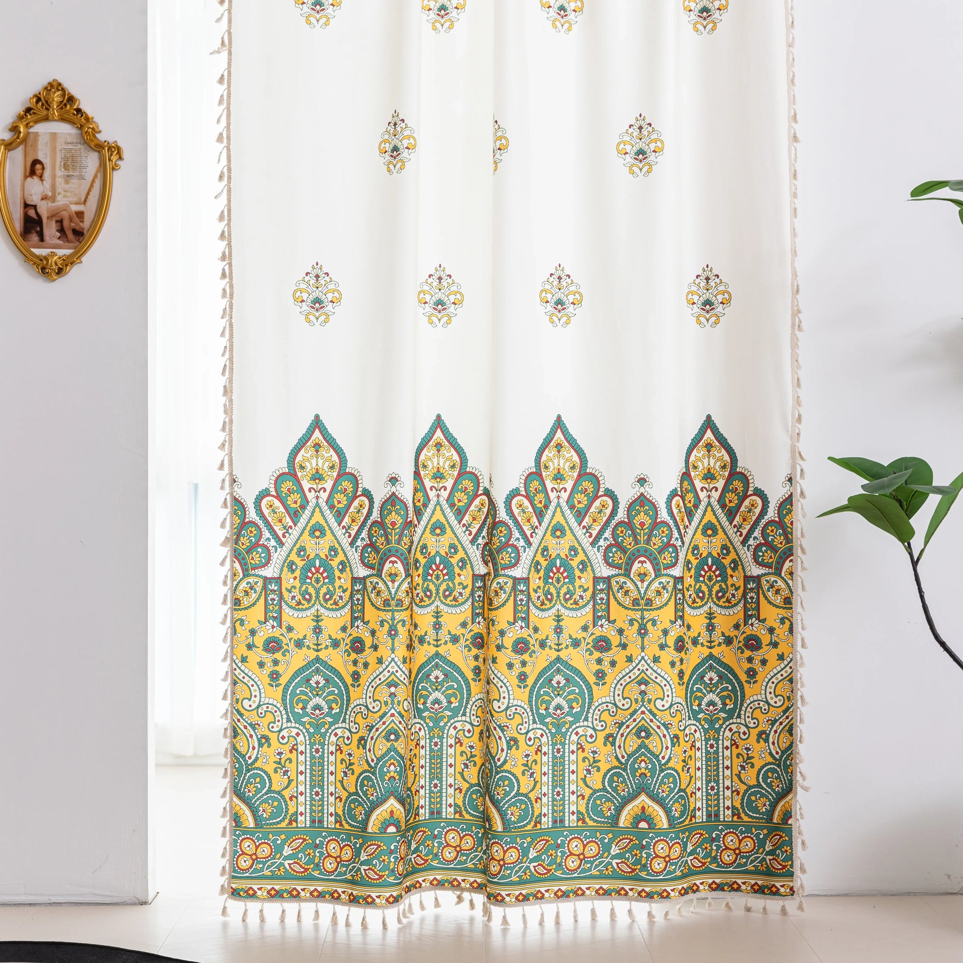 Bohemian Paisley Print Curtains – Brighten your space with these vibrant white curtains featuring an intricate paisley design in rich yellow, green, and red tones. The elegant pattern starts at the base and gracefully fades upward, adding a unique artistic touch to your home décor. Made from lightweight, breathable fabric, they allow soft natural light to flow in while enhancing any living room, bedroom, or creative space with a warm, eclectic charm. Tassel trim along the edges completes the boho-inspired l