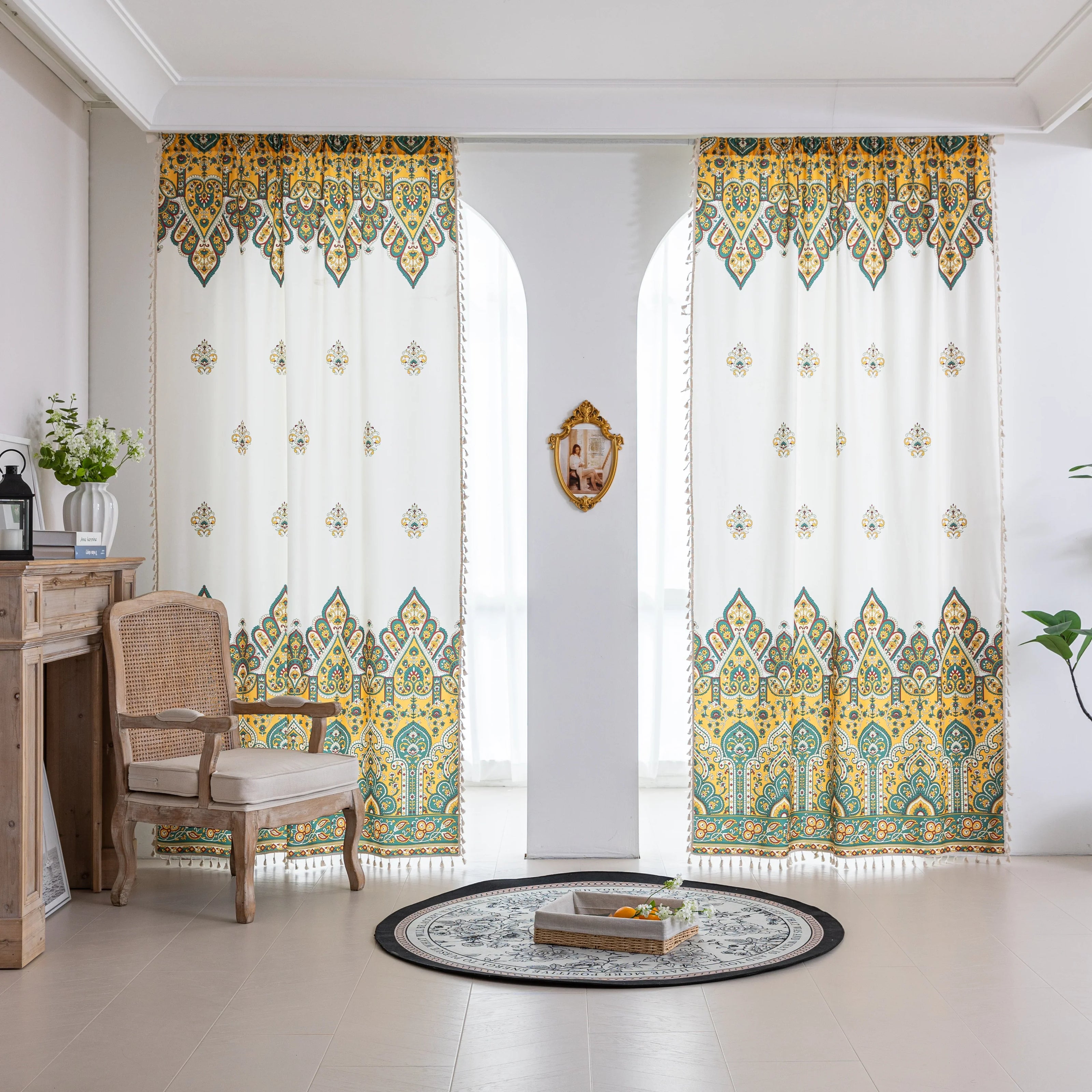 Bohemian Paisley Print Curtains ¨C Brighten your space with these vibrant white curtains featuring an intricate paisley design in rich yellow, green, and red tones. The elegant pattern starts at the base and gracefully fades upward, adding a unique artistic touch to your home d¨¦cor. Made from lightweight, breathable fabric, they allow soft natural light to flow in while enhancing any living room, bedroom, or creative space with a warm, eclectic charm. Tassel trim along the edges completes the boho-inspired