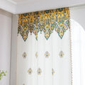 Bohemian Paisley Print Curtains – Brighten your space with these vibrant white curtains featuring an intricate paisley design in rich yellow, green, and red tones. The elegant pattern starts at the base and gracefully fades upward, adding a unique artistic touch to your home décor. Made from lightweight, breathable fabric, they allow soft natural light to flow in while enhancing any living room, bedroom, or creative space with a warm, eclectic charm. Tassel trim along the edges completes the boho-inspired l