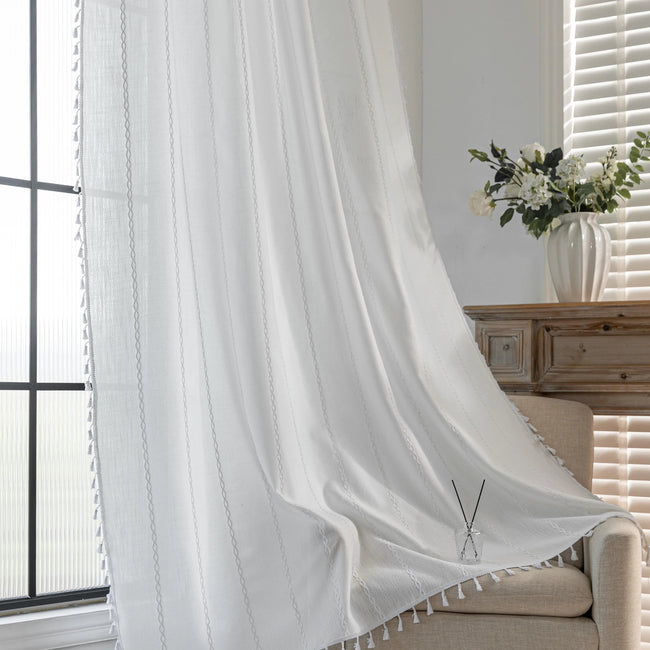 Elegant White Tassel Curtains ¨C Bring timeless charm and brightness to your home with these beautiful white curtains, featuring subtle vertical embroidery and delicate tassel trim. Crafted from soft, airy fabric, they allow natural light to flow in while preserving your privacy. Perfect for living rooms, bedrooms, or dining spaces, their clean, versatile design complements modern, minimalist, coastal, or bohemian d¨¦cor styles. Durable, easy to maintain, and effortlessly stylish, these curtains add a fresh