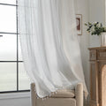 Elegant White Tassel Curtains – Bring timeless charm and brightness to your home with these beautiful white curtains, featuring subtle vertical embroidery and delicate tassel trim. Crafted from soft, airy fabric, they allow natural light to flow in while preserving your privacy. Perfect for living rooms, bedrooms, or dining spaces, their clean, versatile design complements modern, minimalist, coastal, or bohemian décor styles. Durable, easy to maintain, and effortlessly stylish, these curtains add a fresh a