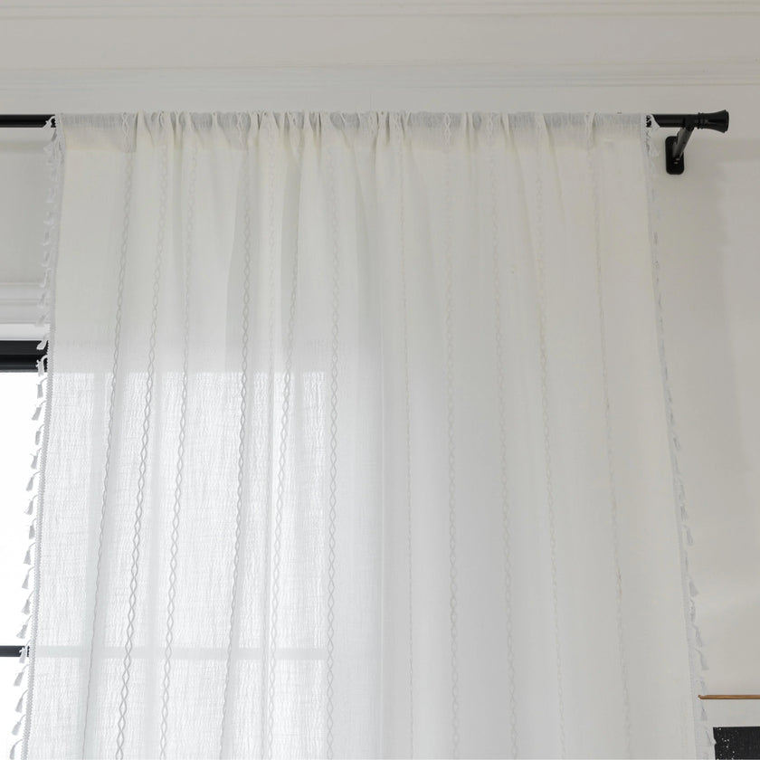 Elegant White Tassel Curtains ¨C Bring timeless charm and brightness to your home with these beautiful white curtains, featuring subtle vertical embroidery and delicate tassel trim. Crafted from soft, airy fabric, they allow natural light to flow in while preserving your privacy. Perfect for living rooms, bedrooms, or dining spaces, their clean, versatile design complements modern, minimalist, coastal, or bohemian d¨¦cor styles. Durable, easy to maintain, and effortlessly stylish, these curtains add a fresh