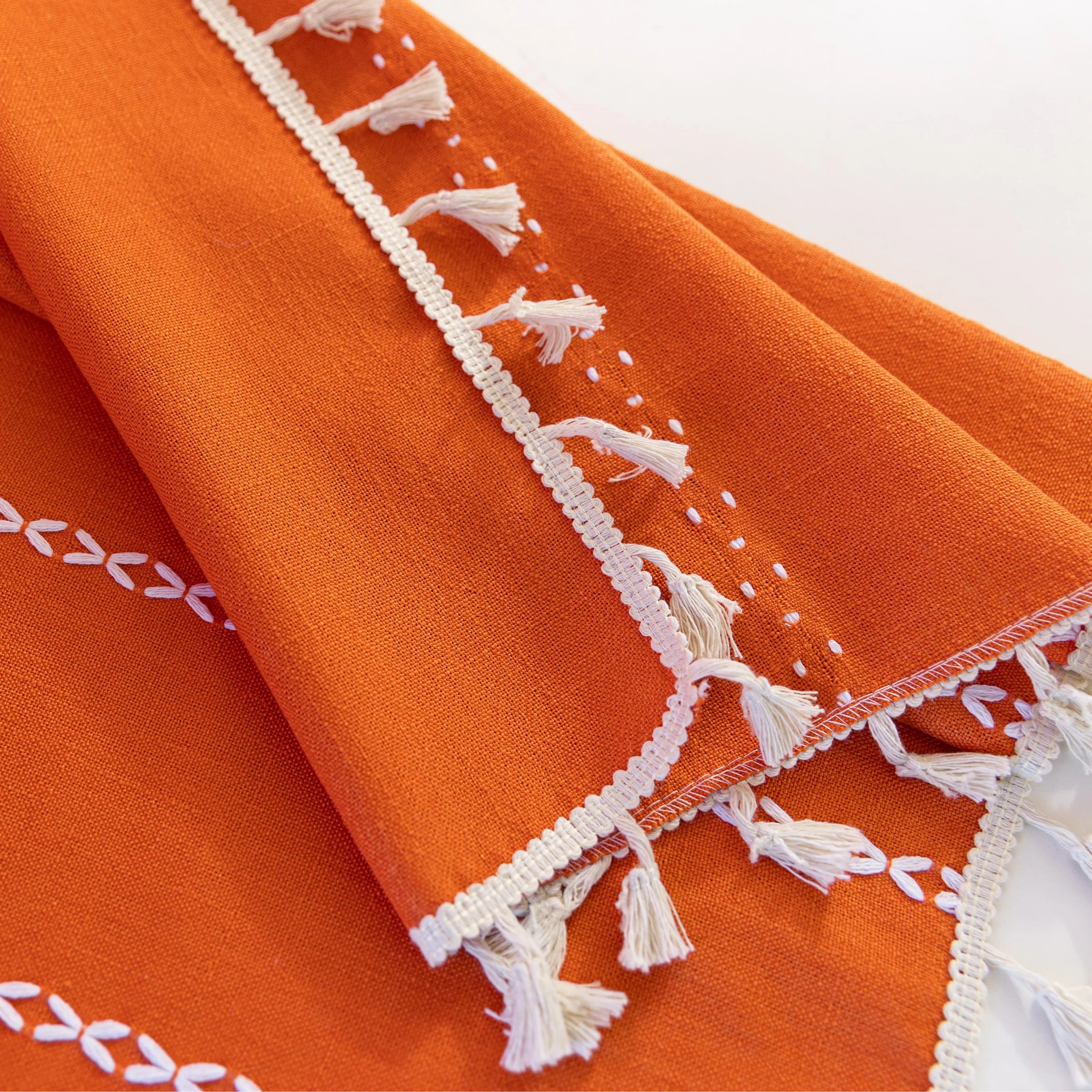 Vibrant Orange Tassel Curtains ¨C Brighten up your space with these stunning orange curtains featuring elegant vertical white embroidery and charming tassel trim. Made from soft, breathable fabric, they allow gentle natural light to filter through while maintaining privacy. Perfect for adding a cheerful, modern touch to living rooms, bedrooms, or creative spaces, their bold color and artisanal detailing blend seamlessly with bohemian, eclectic, or contemporary d¨¦cor. Durable, easy to care for, and stylish,