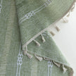 Soft green curtain with delicate vertical white embroidery and tassel trim ¡ª an airy and stylish window treatment ideal for creating a light, refreshing, and cozy atmosphere in any room.