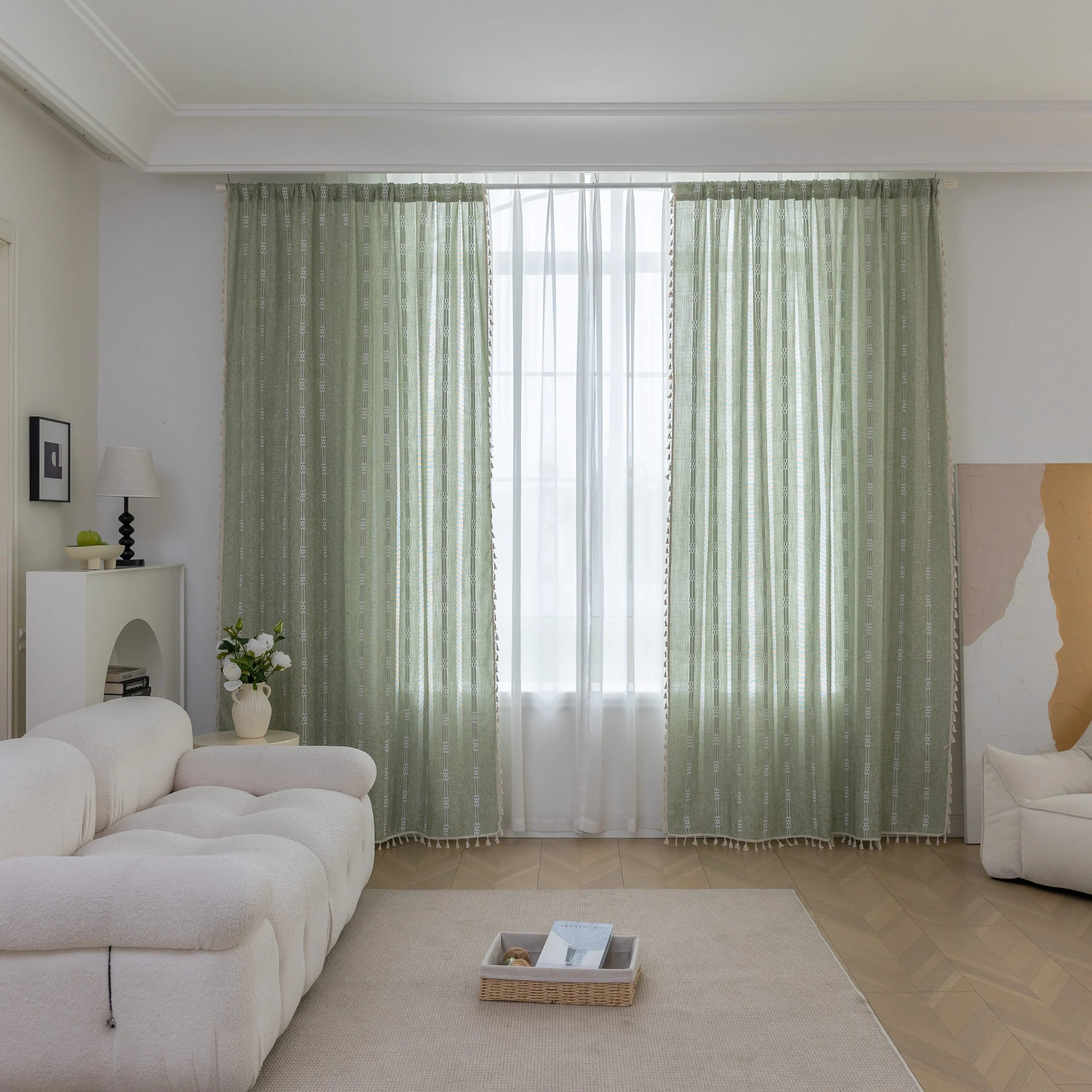Soft green curtain with delicate vertical white embroidery and tassel trim ¡ª an airy and stylish window treatment ideal for creating a light, refreshing, and cozy atmosphere in any room.