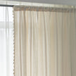 Ivory embroidery curtain styled by a window