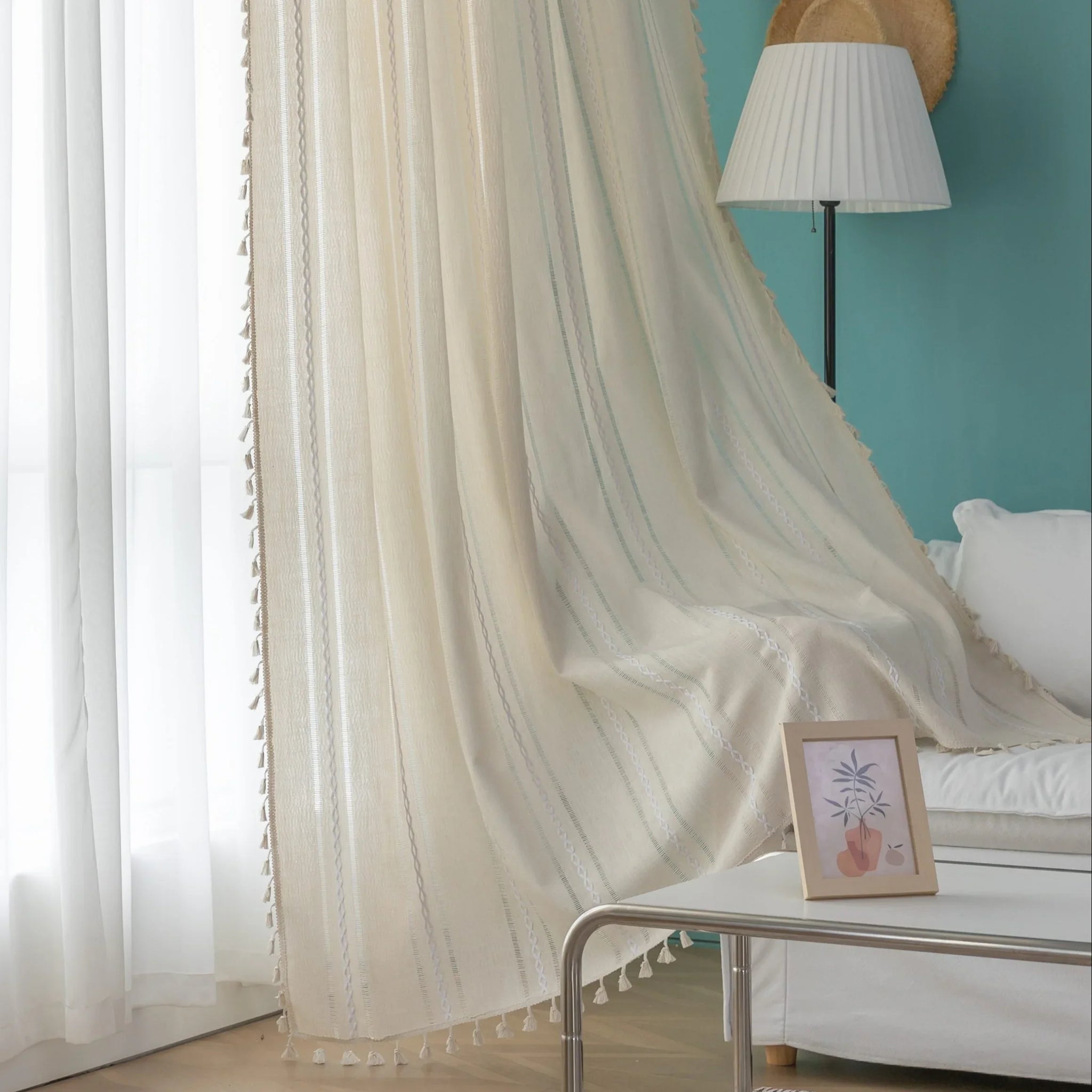 Beige Sheer Tassel Curtains – Elevate your space with these soft beige curtains featuring subtle pastel stripe accents for a touch of modern elegance. Crafted from lightweight, semi-sheer fabric, they gently diffuse sunlight while providing a cozy layer of privacy. The delicate tassel edging adds a charming boho-inspired finish, making them perfect for living rooms, bedrooms, or reading nooks. Ideal for creating a warm, inviting atmosphere in any home décor style.
