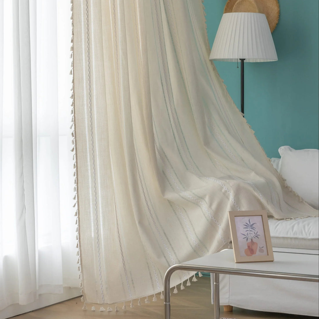 Beige Sheer Tassel Curtains – Elevate your space with these soft beige curtains featuring subtle pastel stripe accents for a touch of modern elegance. Crafted from lightweight, semi-sheer fabric, they gently diffuse sunlight while providing a cozy layer of privacy. The delicate tassel edging adds a charming boho-inspired finish, making them perfect for living rooms, bedrooms, or reading nooks. Ideal for creating a warm, inviting atmosphere in any home décor style.
