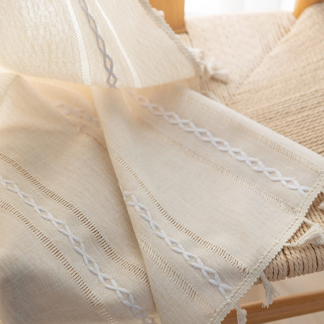 Beige Sheer Tassel Curtains – Elevate your space with these soft beige curtains featuring subtle pastel stripe accents for a touch of modern elegance. Crafted from lightweight, semi-sheer fabric, they gently diffuse sunlight while providing a cozy layer of privacy. The delicate tassel edging adds a charming boho-inspired finish, making them perfect for living rooms, bedrooms, or reading nooks. Ideal for creating a warm, inviting atmosphere in any home décor style.
