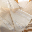 Ivory embroidery curtain with rod pocket top and soft light-filtering fabric