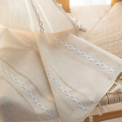 Ivory embroidery curtain with rod pocket top and soft light-filtering fabric