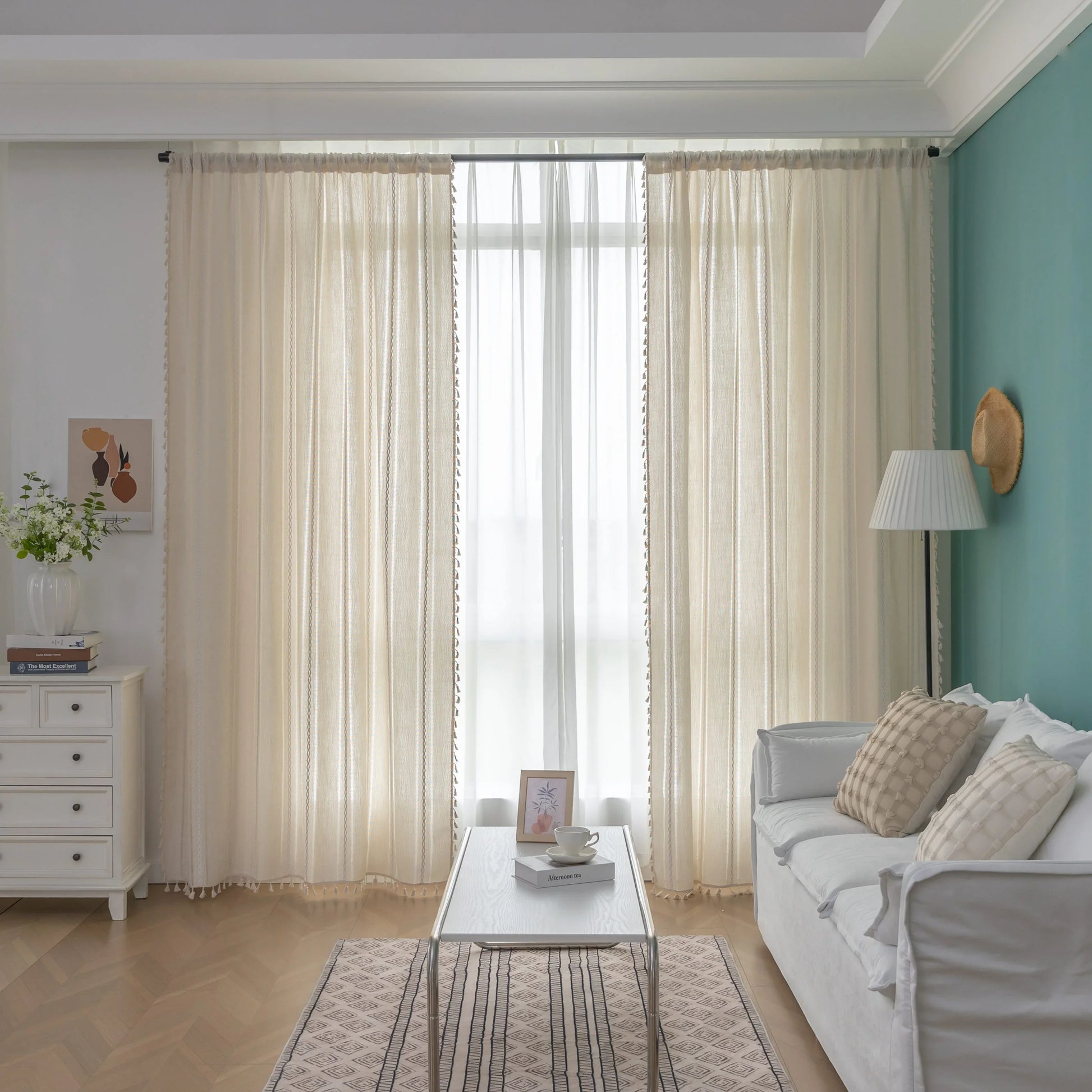 Beige Sheer Tassel Curtains – Elevate your space with these soft beige curtains featuring subtle pastel stripe accents for a touch of modern elegance. Crafted from lightweight, semi-sheer fabric, they gently diffuse sunlight while providing a cozy layer of privacy. The delicate tassel edging adds a charming boho-inspired finish, making them perfect for living rooms, bedrooms, or reading nooks. Ideal for creating a warm, inviting atmosphere in any home décor style.
